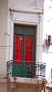 Small balcony with a cast iron railing Royalty Free Stock Photo