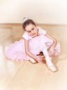 Small ballerina at dancing school