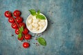 Small balls mozzarella cheese with Cherry tomatoes and basil Royalty Free Stock Photo