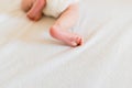 Small bare and soft baby feet
