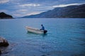 Old fisherman on small fishing boat. Korcula Island and Peljesac peninsula in southern Croatia.