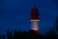 A small and beautiful lighthouse at night and bright light in FalshÃÂ¶ft, Germany Royalty Free Stock Photo