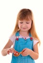 Small beauty girl with white tablet and spoon Royalty Free Stock Photo