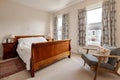 Small bedroom space in typical british victorian home Royalty Free Stock Photo