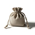 A small beige burlap bag with drawstrings on a white background Royalty Free Stock Photo