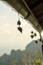 Small bell hanging under roof in temple Royalty Free Stock Photo