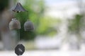 Small bell home decoration hanging on roof and blurry background Royalty Free Stock Photo