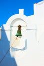 Small bell tower of ancient greek church in Mykonos