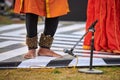 Small bells Ghungroo on male feet of indian dancer for ancient ethnic Kathak dance