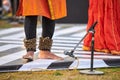 Small bells Ghungroo on male feet of indian dancer for ancient ethnic Kathak dance