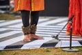 Small bells Ghungroo on male feet of indian dancer for ancient ethnic Kathak dance