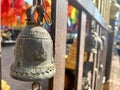 Small bells hung with red thread decorate the temple fence. Royalty Free Stock Photo