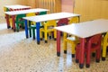 Small benches and small colored chairs in preschool Royalty Free Stock Photo