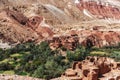 Small Berber village located in a green oasis valley with fields and palm trees , Morocco in the Atlas Mountains Royalty Free Stock Photo