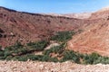 Small Berber village located in a green oasis valley with fields and palm trees , Morocco in the Atlas Mountains Royalty Free Stock Photo