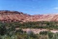 Small Berber village located in a green oasis valley with fields and palm trees , Morocco in the Atlas Mountains Royalty Free Stock Photo