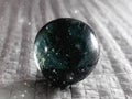 A small marble with the reflexon of universe.