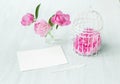 Small bird cage with peony flower bouquet, invitation card template with text space, Shabby Chic Provence Interior Royalty Free Stock Photo