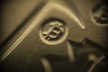 small bitcoin logo on bitcoin souvenir coin in macro