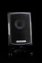 A small, black audio speaker for a computer Royalty Free Stock Photo