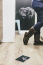 Small black board drawed on a wooden floor indoor scene