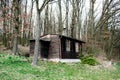 Small black cabin in the woods spring europe czech republic travell. Into the woods. Royalty Free Stock Photo