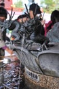 Small black dragon sculpture fountain in Sensoji temple in Asakusa, Japan Royalty Free Stock Photo