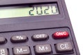 A small, black pocket calculator, shot close up in macro, on a clean, white background Royalty Free Stock Photo