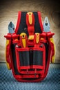 Small black and red construction toolbelt with tools Royalty Free Stock Photo