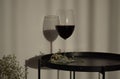 Glass of red wine on a small black table