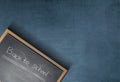 Small blackboard with the text of back to school Royalty Free Stock Photo