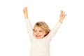 Small blond child raising his arms