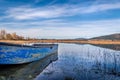 Small blue abandoned fishing boat Royalty Free Stock Photo