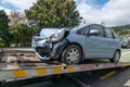 Honda Jazz on the back of a tow truck after an accident Royalty Free Stock Photo