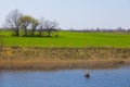 Small blue river flow among a prairie Royalty Free Stock Photo