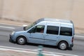 Small blue van, Ford Tourneo Connect along Barcelona's Ronda Litoral Royalty Free Stock Photo