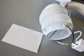 Small Bluetooth headphones, white color, close-up