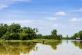 Small boat on the countryside river Royalty Free Stock Photo