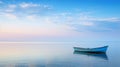 Small boat floating on top of a large body of water Royalty Free Stock Photo