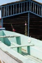 Small boat front wood hut in oyster village in Marennes Oleron in France Royalty Free Stock Photo