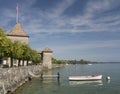 Small boat on the Geneva lake near the Chateau de Rolle