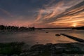 Small boat harbor with a bridge and boats in pink evening sunlight Royalty Free Stock Photo