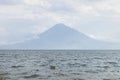 Small boat on lake Atitlan with view to the volcano at Panajachel, Guatemala