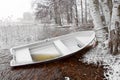 Small boat in lake in early spring Royalty Free Stock Photo