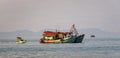 a small boat in a large body of water on phu quoc in vietnam Royalty Free Stock Photo