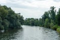 Small boat on limmat river with trees Royalty Free Stock Photo