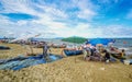 A small boat local fishery group is removing crabs, fish and sea creatures caught from their nets at Jomtien Beach