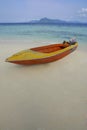Small boat at the lonely beach Royalty Free Stock Photo