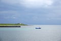 Small Boat Moored Off Scottish Island
