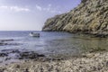 Small boat moored in a tranquil bay Royalty Free Stock Photo